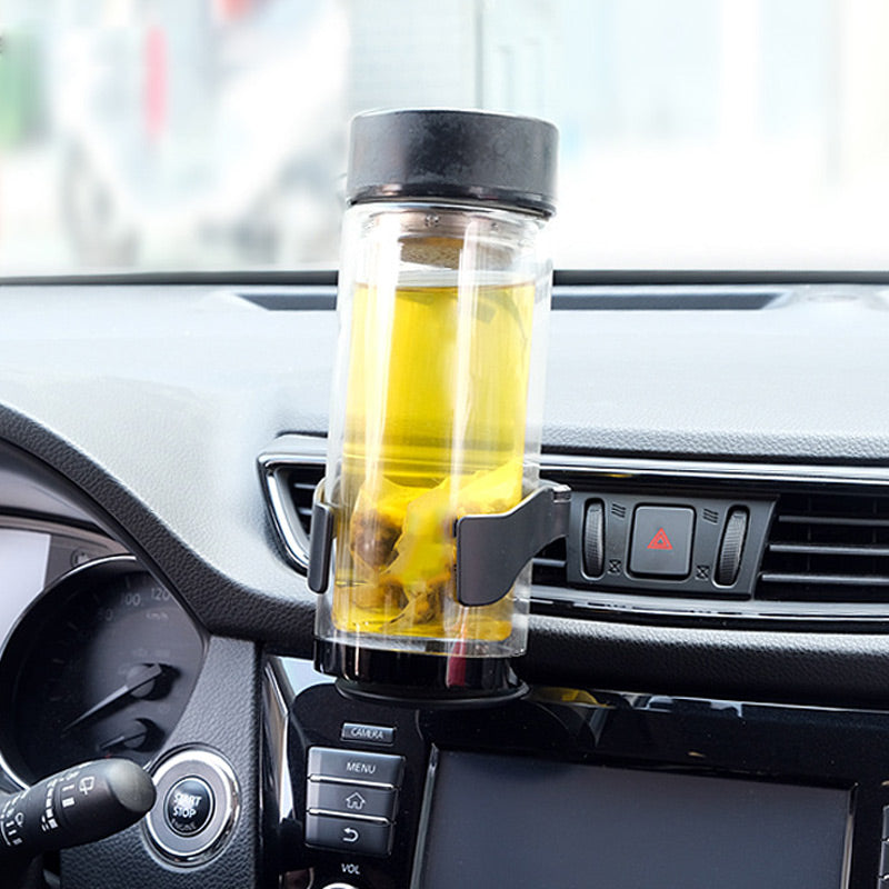 Monitoiminen mukiteline autoon